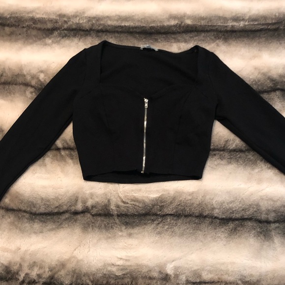 Charlotte Russe Tops - Long sleeve zip up crop too from Charlotte Russe!